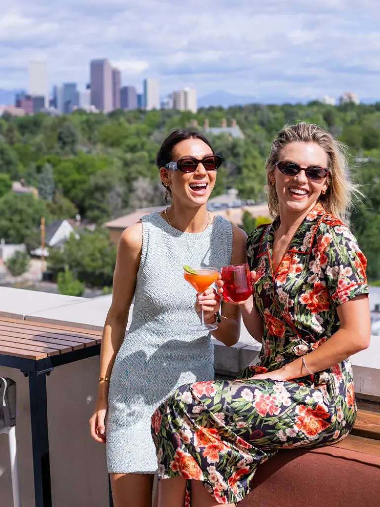 Smiling people with cocktails