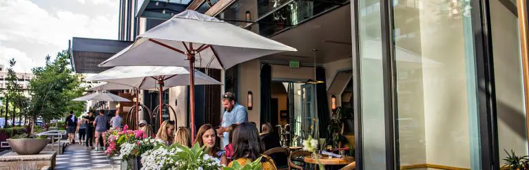 People eating on a patio