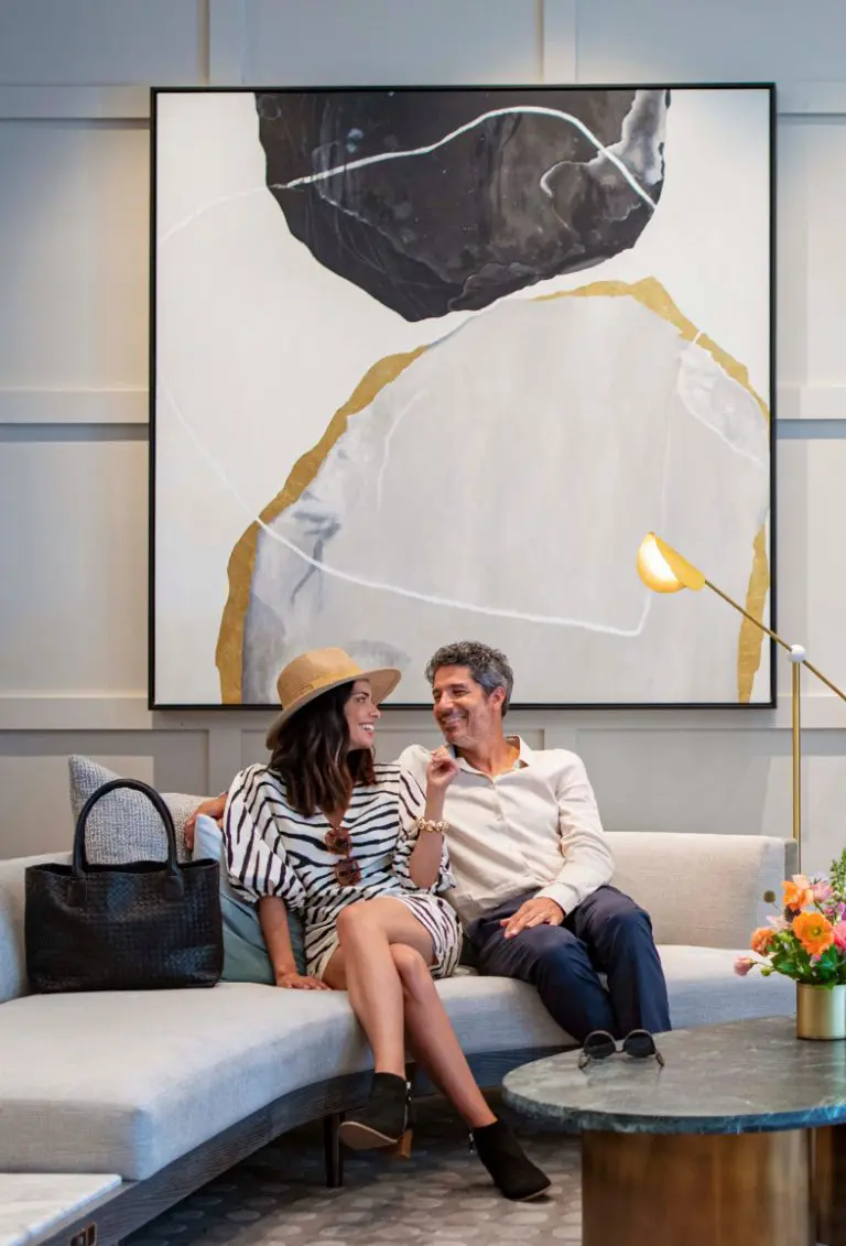 People smiling on couch