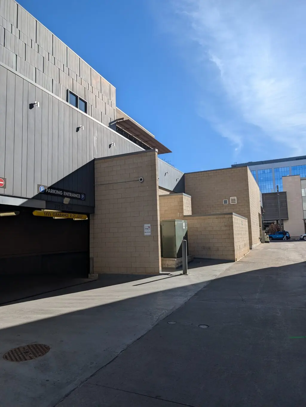 Entrance to the 215 Saint Paul Garage. Parking entrance sign visible.