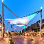 Cherry Creek North street scene with illuminated art installation.