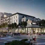 Rendering of a modern mixed-use building with retail and residential spaces.