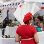A woman in a red dress at an event