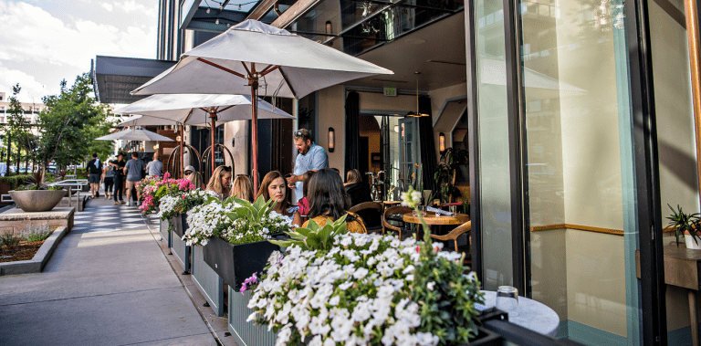 People eating on a patio