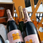 Veuve Clicquot champagne bottles in ice at a DJ brunch.
