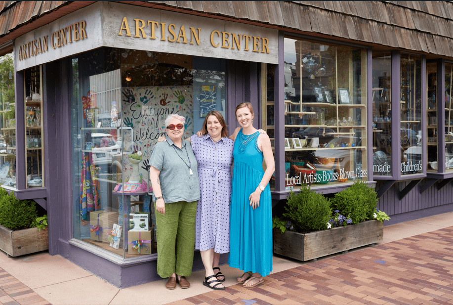 Women outside Artisan Center in Cherry Creek North. Local art, books, and glass.