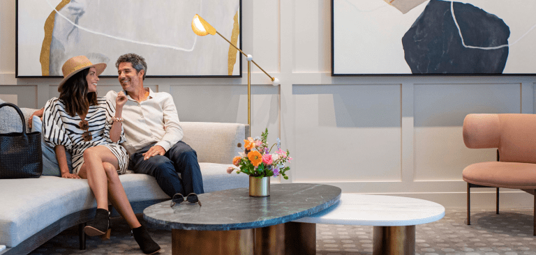 A couple sitting on a couch