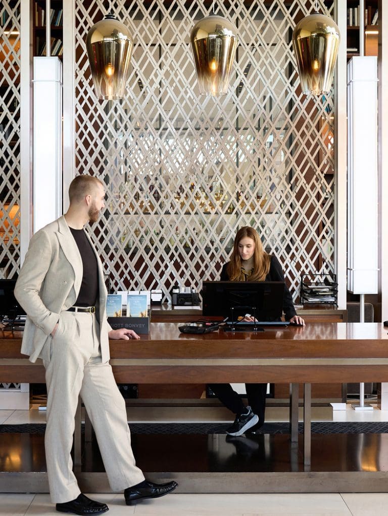 People in a hotel lobby
