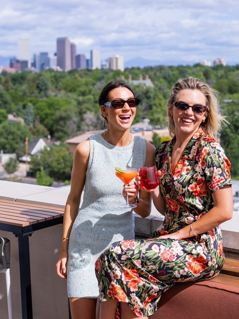 Smiling people with cocktails
