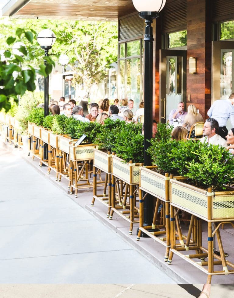 People eating on a patio