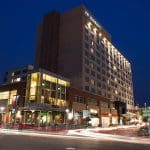 JW Marriott hotel exterior at night, named a top business hotel.