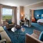 JW Marriott Denver hotel suite with living room and bedroom view.