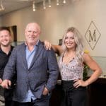 Mark's Diamonds team photo in their jewelry store.