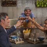 Couple toasting drinks at a Denver restaurant, enjoying a date night.