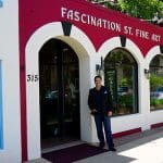 Fascination St. Fine Art gallery exterior with man standing at entrance.