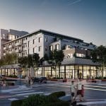 Rendering of a modern mixed-use building with retail and residential spaces.