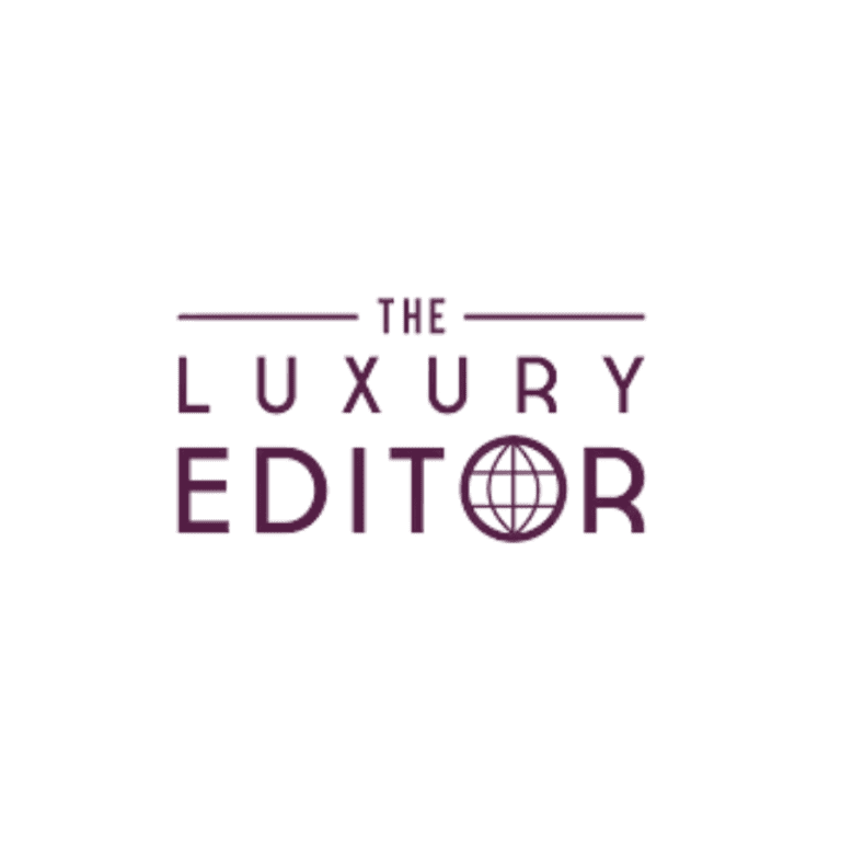 The Luxury Editor logo featuring text and a globe icon.