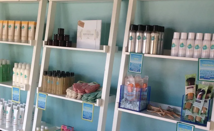 Alix Peterson Sinless Sun Spray Tanning products on display shelves